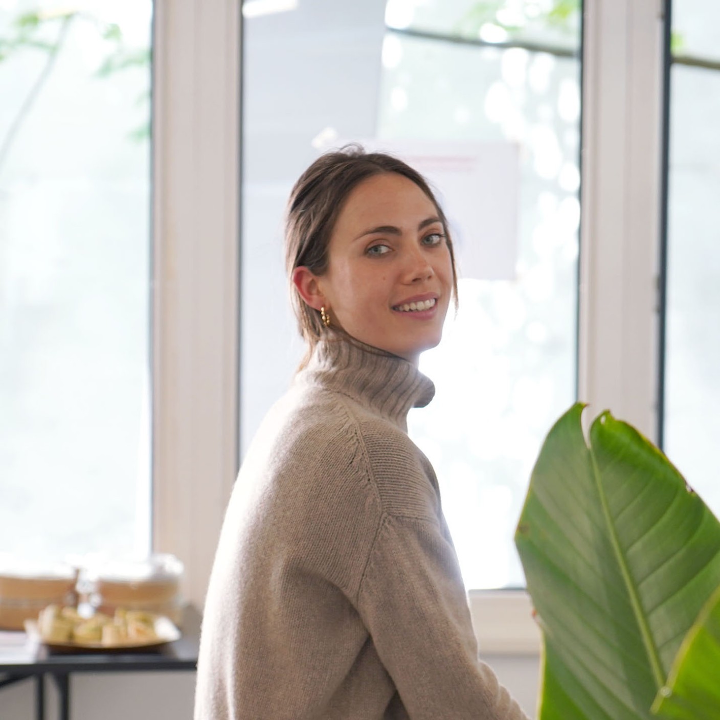 A photo of Morganne Graves in a light brown turtleneck