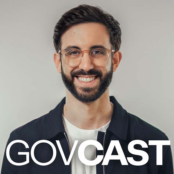 Portrait of Faruk Tuncer, founder and CEO of GovTech Polyteia and podcast host, against a gray background. 'GOVCAST' is written in large letters at the bottom of the picture.